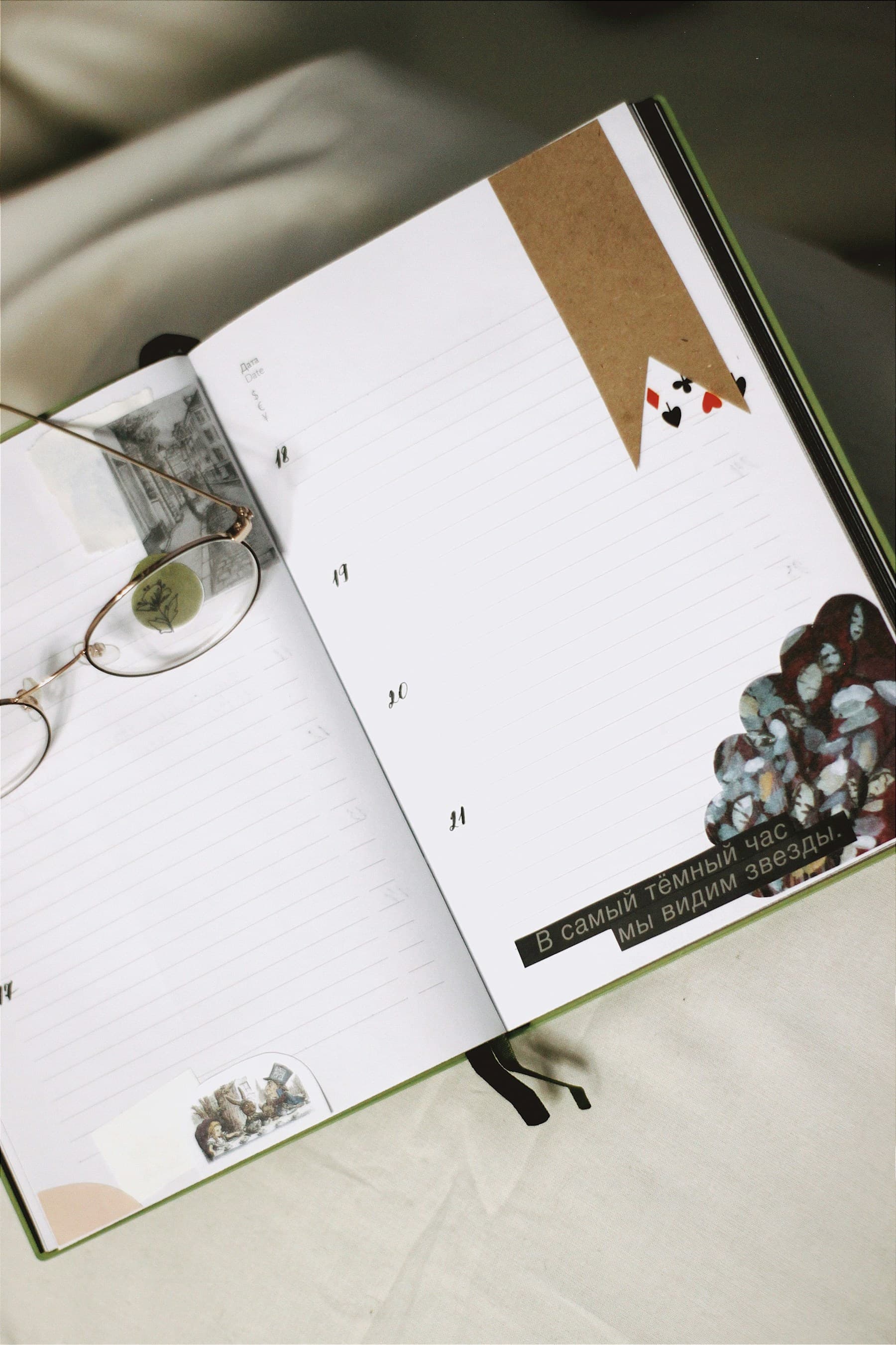 Blue-toned notebook image used as the Contact page header